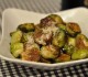 Baked brussels sprouts with olive oil, salt, pepper, parmesan and balsamic vinegar.